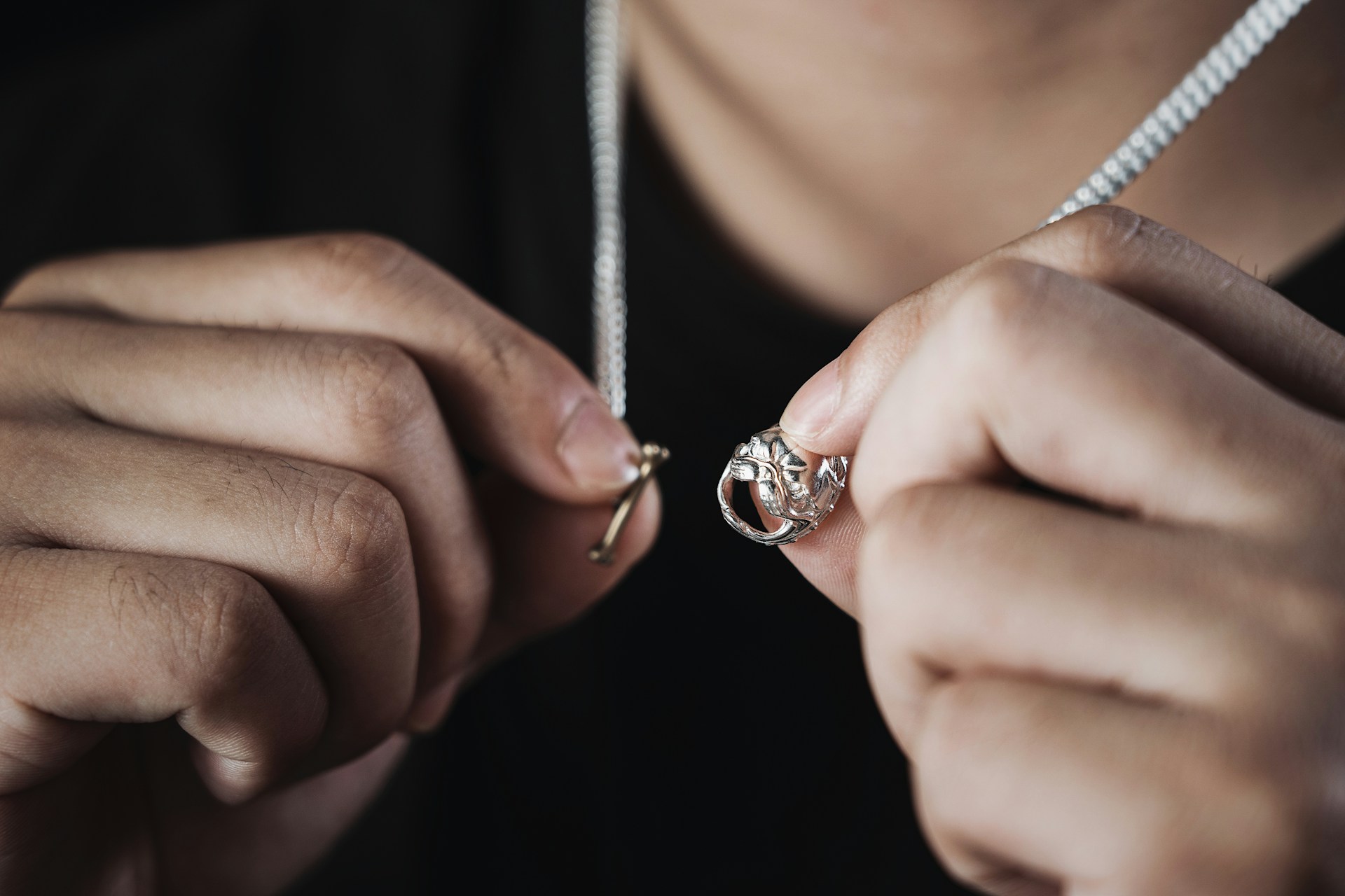 clasping a necklace jewelry