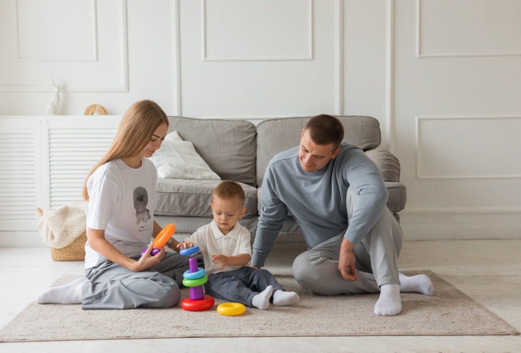 family playing with toys