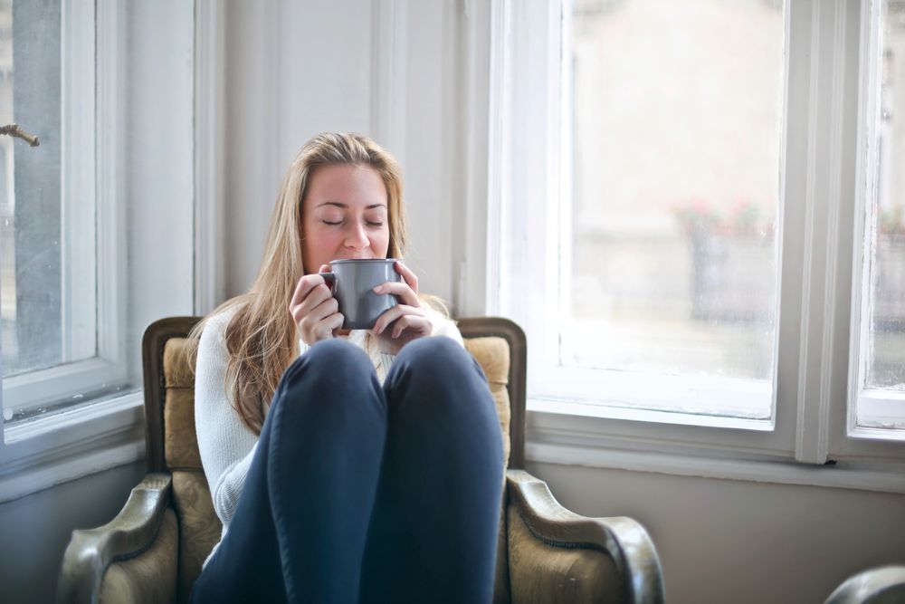 woman holding mug