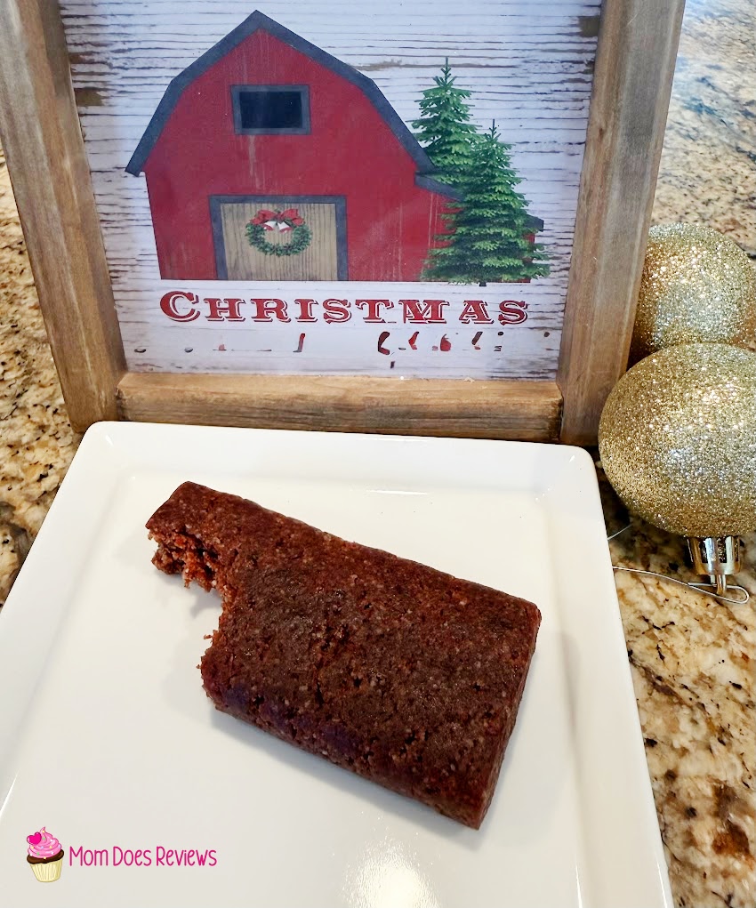 Sara's 5/Day Organic Bar unwrapped with a bite out of it