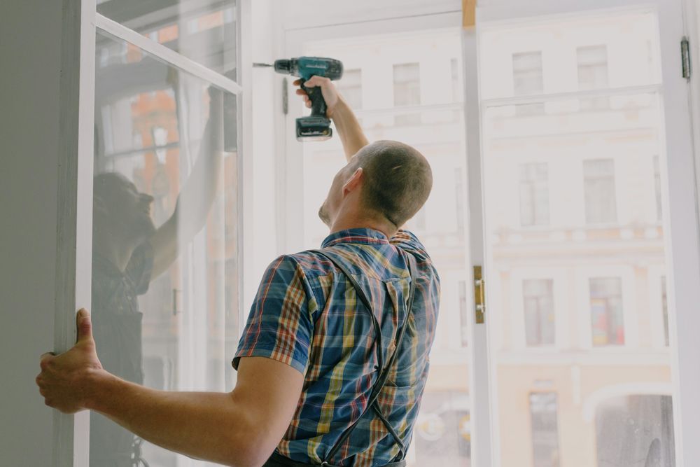 handyman installing window