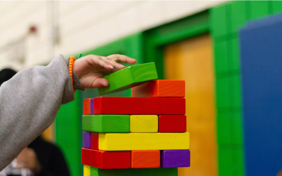 kid stacking blocks