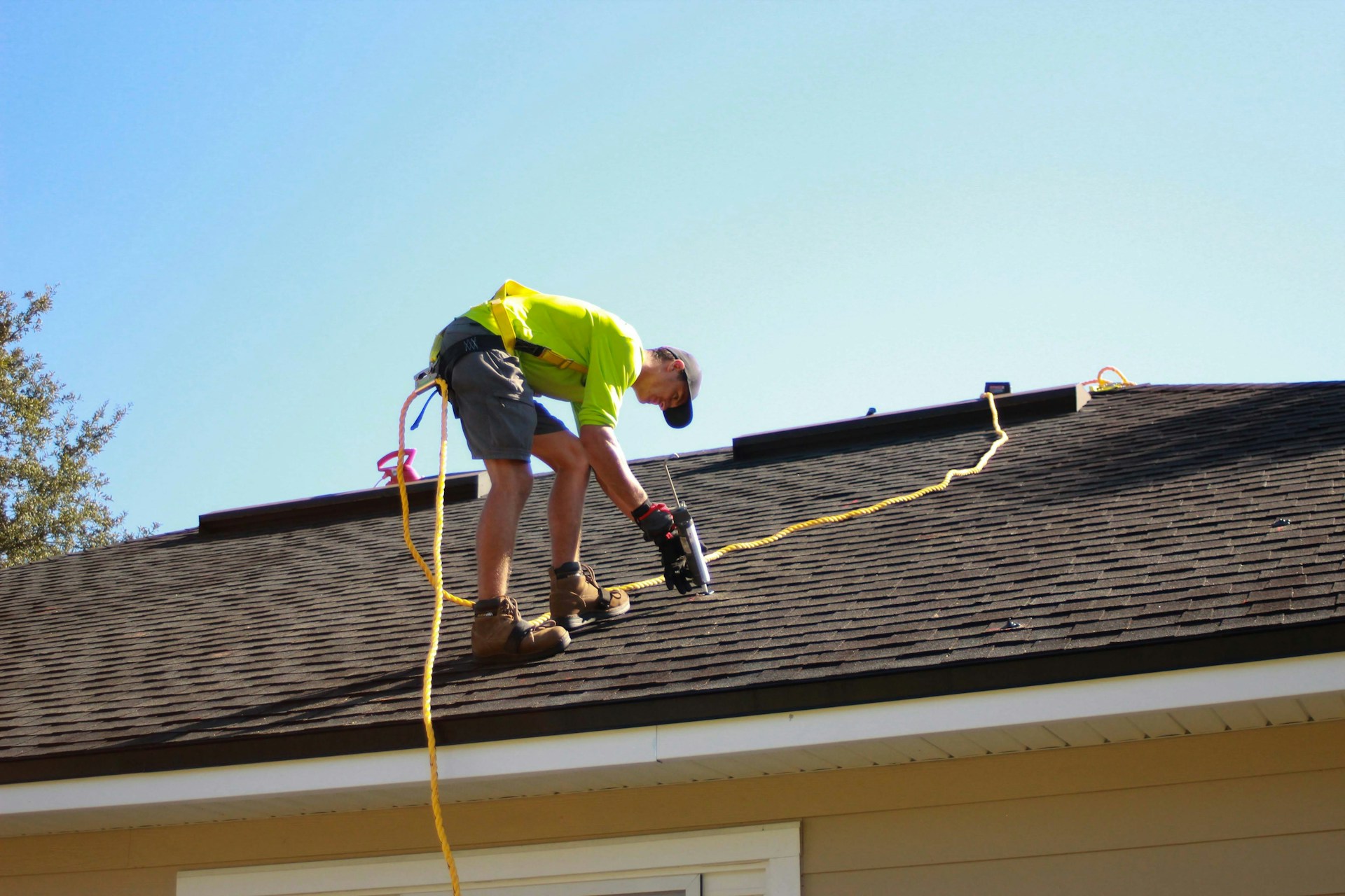 man working on roof