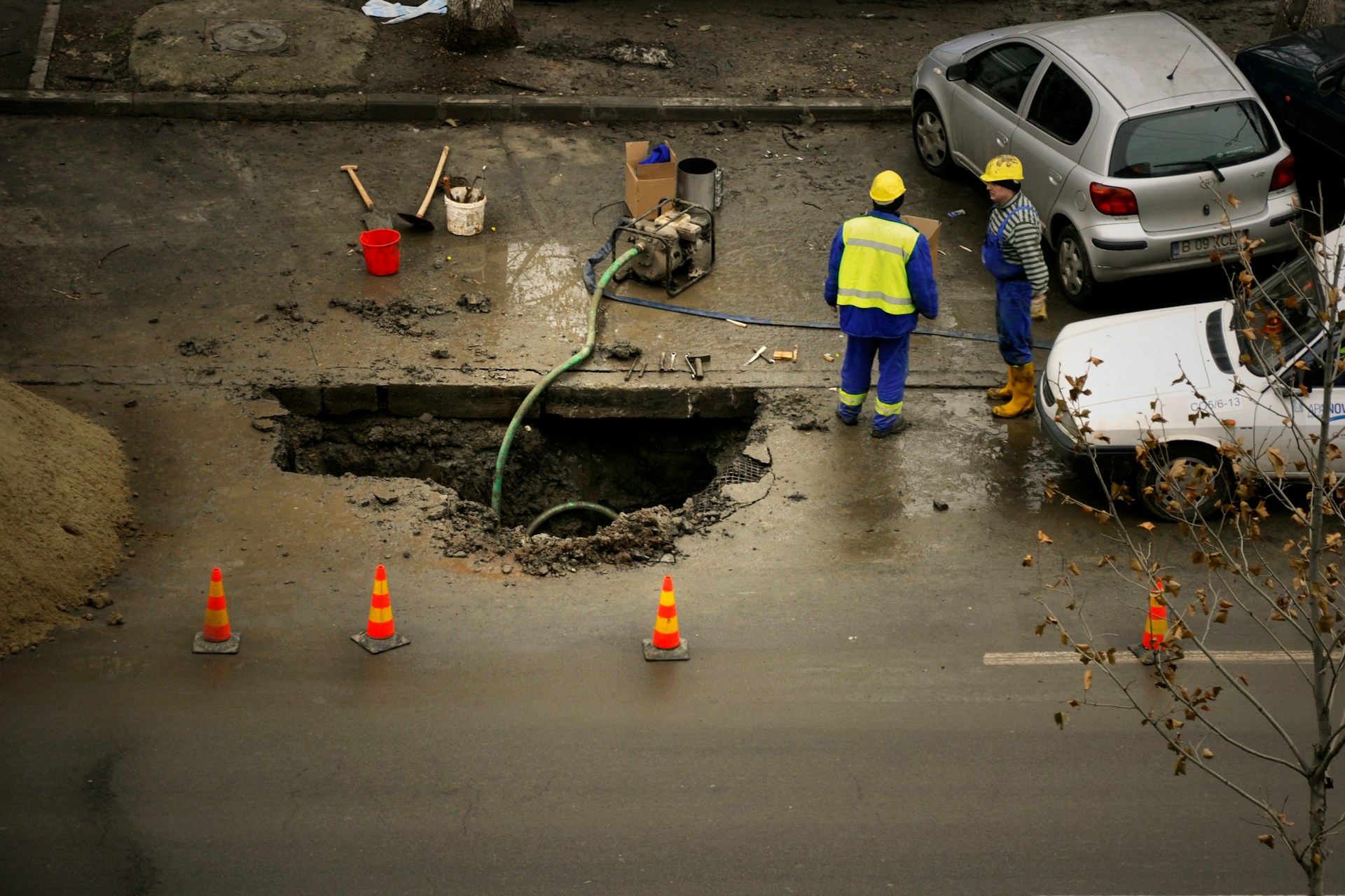people fixing the road
