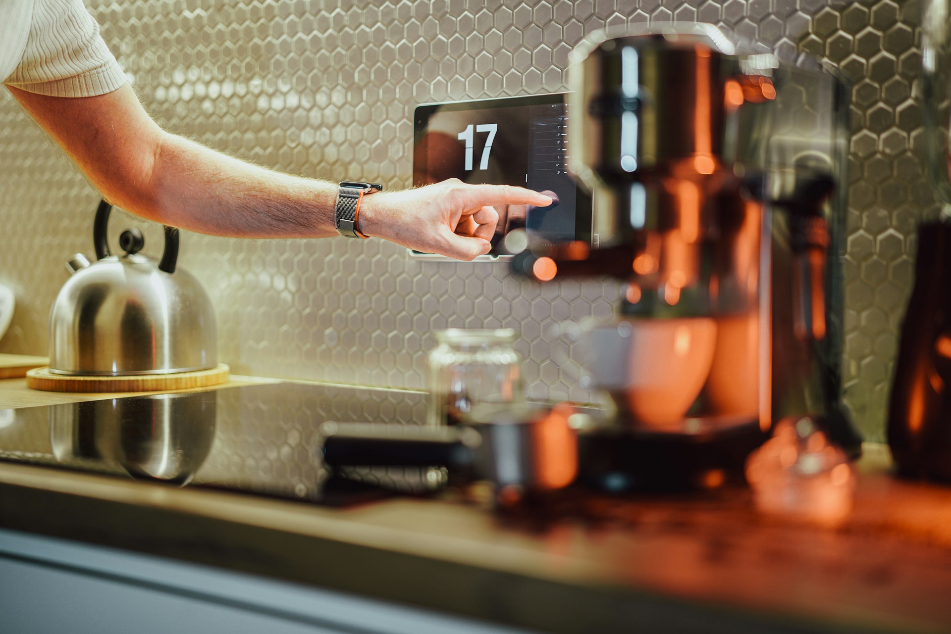 pressing button on coffee machine
