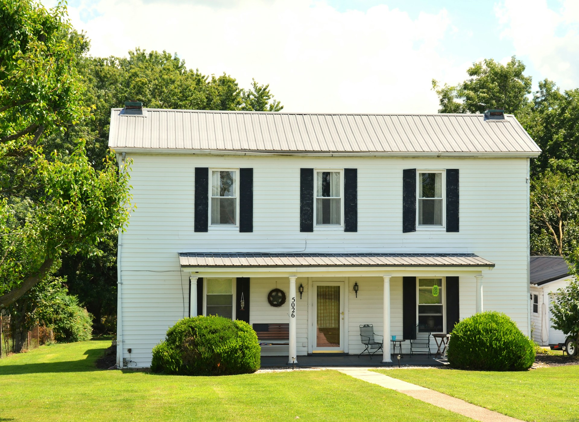 white house with black shutters